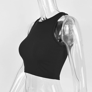 Close-up of black ribbed knit crop top featuring slim fit design and premium cotton texture