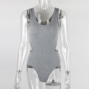 Close-up of dark grey rib-knit bodysuit featuring unique side waist cut-outs and a U-neck