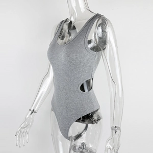 Detail of grey ribbed bodysuit featuring waist cut-outs on a transparent mannequin