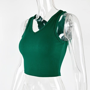Close-up of deep green ribbed v-neck crop top on mannequin showing texture and racerback