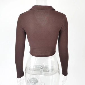 Rear view of long sleeve dark brown ribbed polo crop top showing quality stitching
