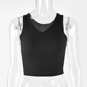 Detail shot of black ribbed cotton crop top featuring a deep V-neck and slim fit design