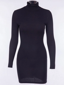 Detail of high neck ribbed knit fabric on a slim fit black long sleeve mini dress
