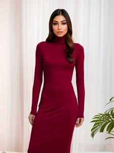 Detail of the slim fit burgundy turtleneck maxi dress with soft ribbed knit texture
