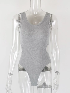 Detail showing the gray ribbed fabric texture and side waist cut-out of the bodysuit