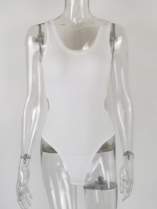 Detailed view of white ribbed bodysuit featuring side cut-out and u-neck design