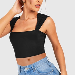 Slim fit black cropped tank top with square neck and pleated straps on grey background
