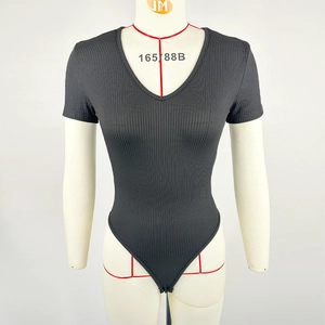 Detail of V-neck ribbed bodysuit with short sleeves and snap button closure