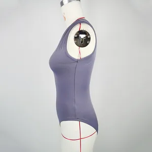 Detail of purple sleeveless bodysuit featuring slim fit fabric and side high-cut design