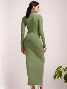 Detail of olive green turtleneck maxi dress showing form-fitting fabric and sleek back view
