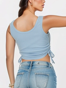 Detail view of light blue ribbed crop top with adjustable side drawstring ties
