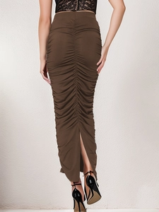 Back view of elegant dark brown ruched bodycon skirt with stylish rear split detail