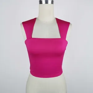 Peach pink slim fit sleeveless crop top with wide shoulder straps in a ribbed knit style