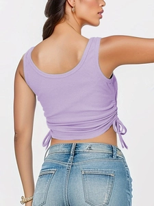 Detail view of the lavender rib-knit crop top featuring a side drawstring and open back design