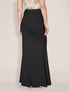 Detailed back view of high-waist black maxi skirt with side ruched pleat design