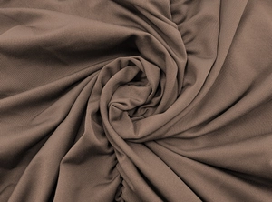 Macro detail of the dark coffee ribbed knit fabric showing soft texture and fine vertical lines