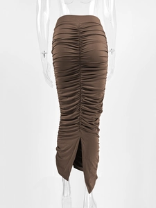 Detailed back view of high waist ruched maxi skirt with central seam and rear slit