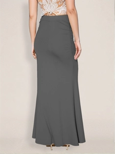 Detail view of the deep gray maxi skirt with side ruched design and fishtail silhouette