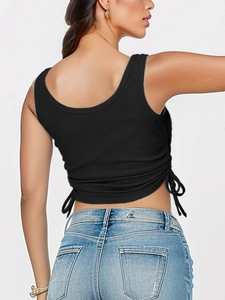 Detailed back view of ribbed black crop top with side drawstring ties and ruched detail