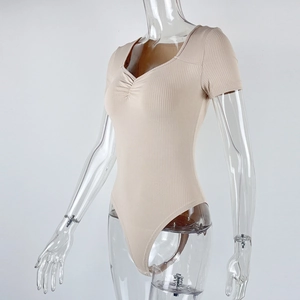 Detail of V-neck ribbed bodysuit with ruched chest and slim fit short sleeves