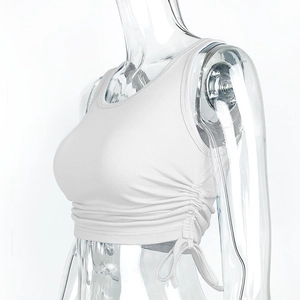 Close-up of white rib-knit fabric texture and adjustable side drawstring details