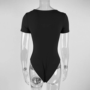 Close-up of black short sleeve ribbed bodysuit showing back view and knit texture details