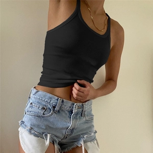 Detail shot of black ribbed cotton tank top paired with frayed denim shorts for a slim fit