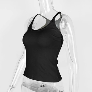 Detail of black ribbed knit cotton tank top showing fabric texture and slim fit design