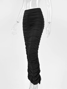 Detail view of black high-waisted ruched midi skirt with bodycon fit and elastic fabric