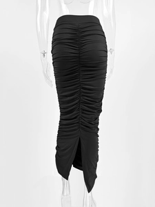Detail view of the high waist ruched black midi skirt featuring a back slit design
