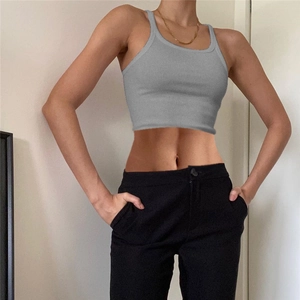 Detail view of grey ribbed cotton crop top with U-neck design on a female model