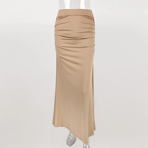 Detail view of khaki bodycon skirt with pleated waist and asymmetric hem design