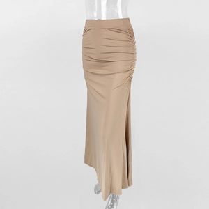 Detailed side view of khaki long maxi skirt featuring ruched texture and slim fit design