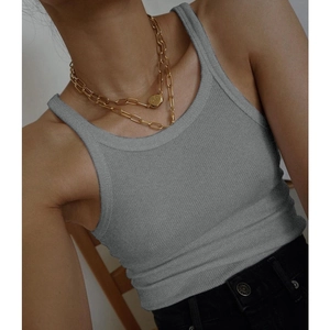 Close-up of grey ribbed knit texture on a slim-fit U-neck sleeveless tank top for women
