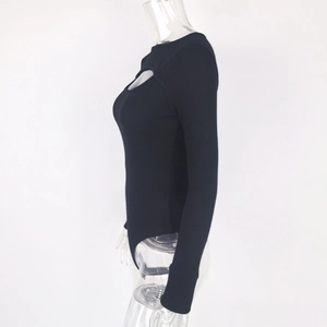 Detail of water-drop cutout and ribbed texture on the black long sleeve bodysuit