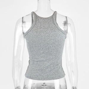 Close-up of gray cotton ribbed fabric texture and racerback detail on the slim-fit tank top