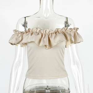 Detailed view of beige off-the-shoulder top featuring double-layered ruffles and ribbed texture