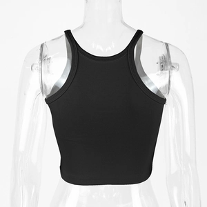 Detail of black ribbed cotton crop top showing the racerback cut and high-quality texture