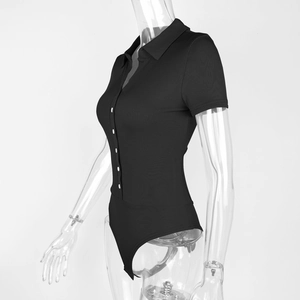 Detail of ribbed knit bodysuit with polo collar and white buttons on a clear mannequin