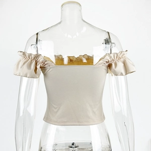 Back view of beige off-shoulder rib-knit top featuring ruffled sleeves and texture