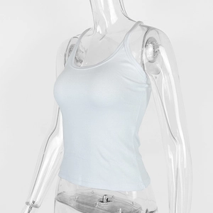 Close-up of white ribbed cotton fabric and slim U-neck tailoring on women's tank top
