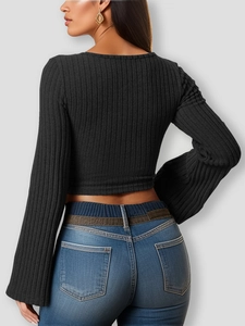 Rear view of slim fit black ribbed long sleeve crop top with square neck and flare sleeves