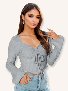 Slim fit grey V-neck ribbed crop top featuring flared sleeves and front drawstring tie