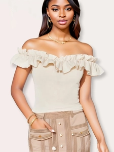 Elegant beige off-shoulder top with ruffle trim for women shown in a medium shot view