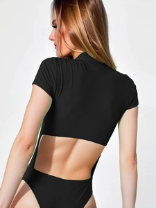 Sleek backless ribbed bodysuit for women with cutout design and high-cut leg silhouette