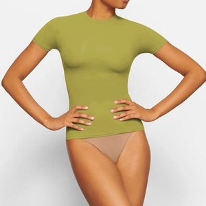 Close-up of olive green slim-fit t-shirt showing round neck detail and ribbed fabric texture