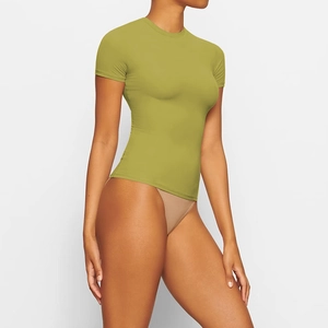 Side view detail of olive green slim fit T-shirt showing fabric elasticity and clean cut