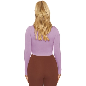 Rear view of slim fit purple long sleeve crop top with high waist brown trousers