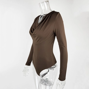 Detail view of deep brown slim fit bodysuit with cowl neck and textured fabric