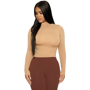 Detail view of khaki mock neck long sleeve slim fit knit top with soft ribbed texture